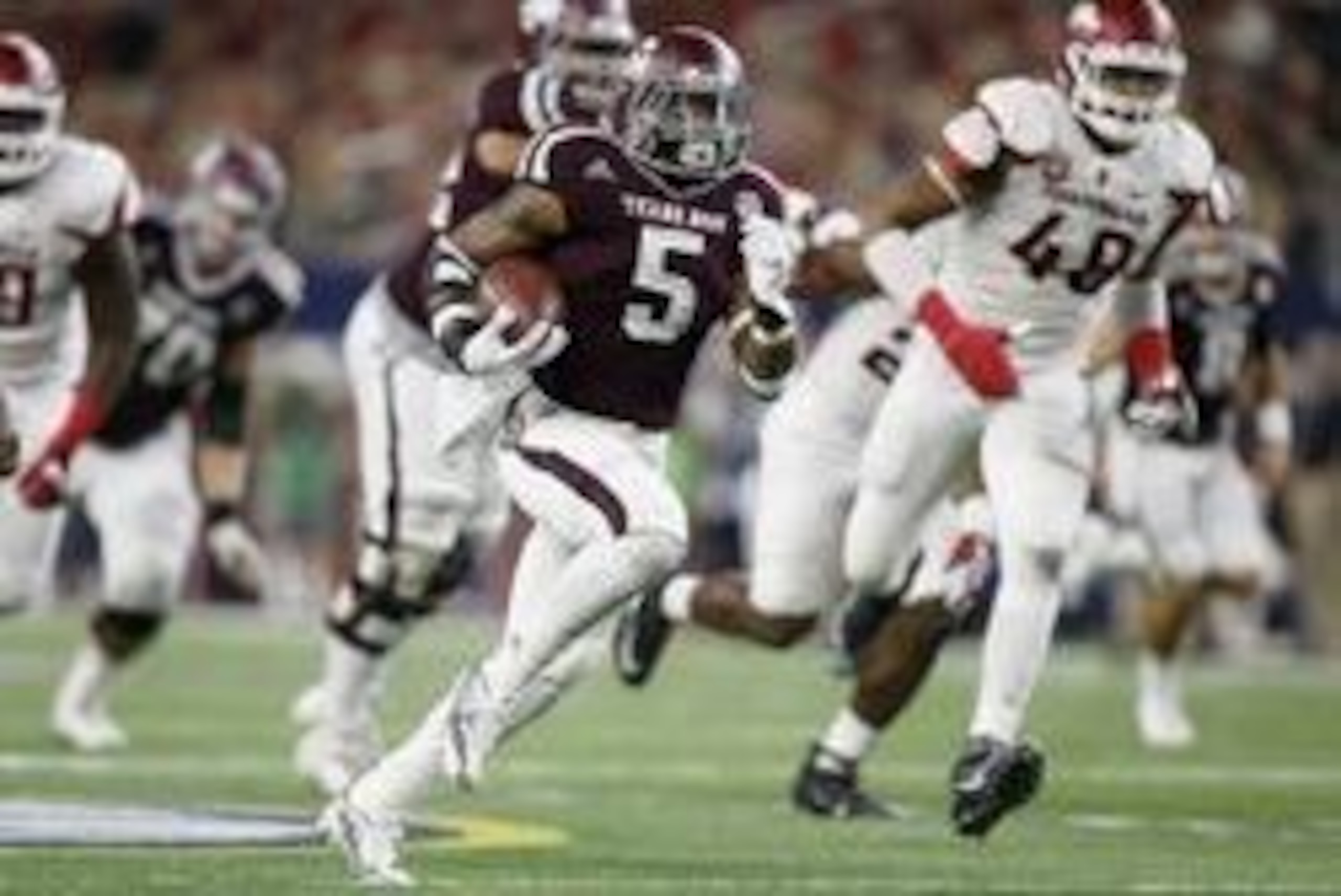 Sep 24, 2016; Dallas, TX, USA; Texas A&M Aggies running back Trayveon Williams (5)  runs for a touchdown in the fourth quarter against Arkansas Razorbacks defensive lineman Deatrich Wise Jr. (48)  at AT&T Stadium. Mandatory Credit: Tim Heitman-USA TODAY S
