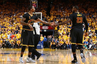 OAKLAND, CA - JUNE 19:  J.R. Smith #5 of the Cleveland Cavaliers high fives LeBron James #23 of the Cleveland Cavaliers during the game against the Golden State Warriors in Game Seven of the 2016 NBA Finals on June 19, 2016 at Oracle Arena in Oakland, Cal