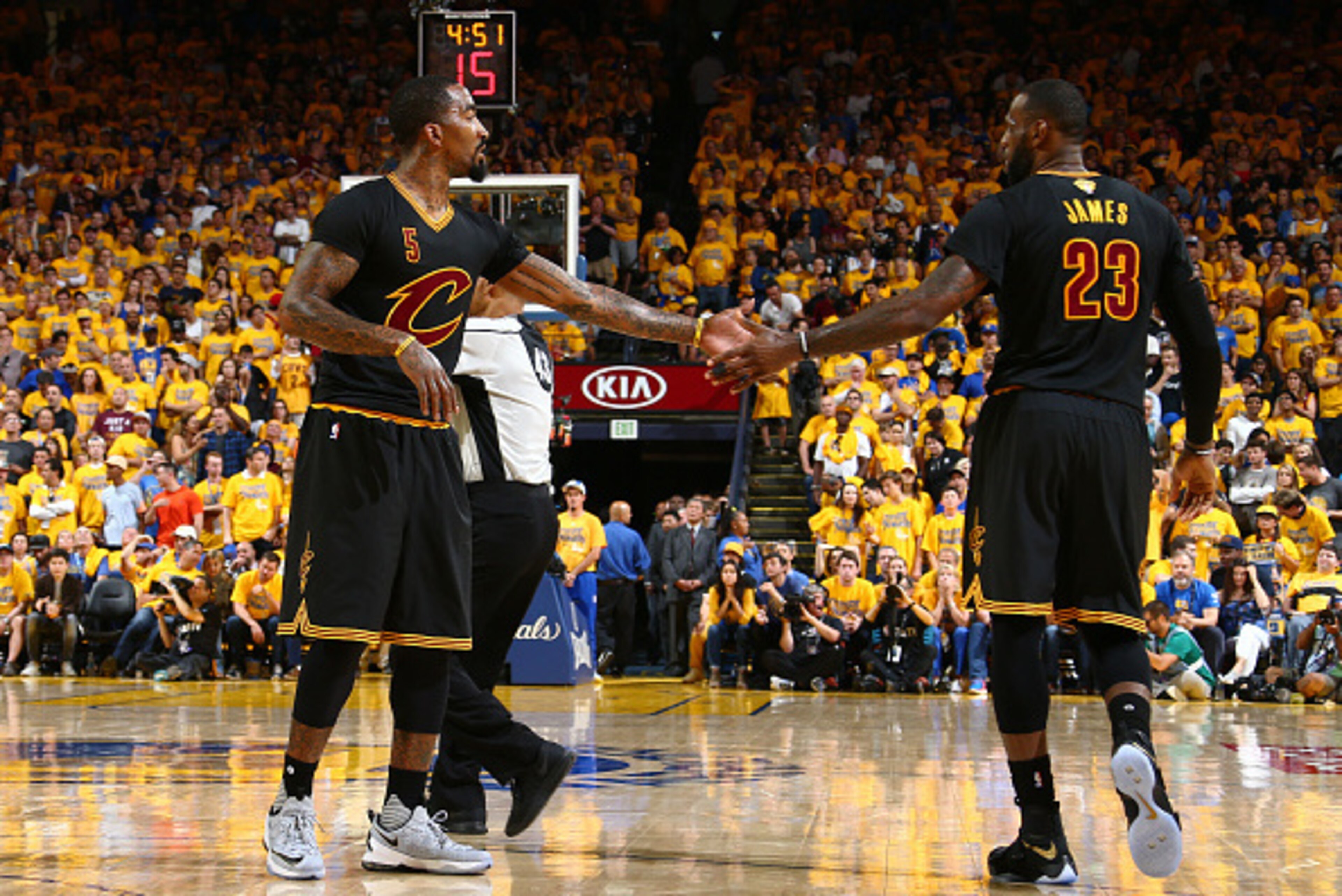 OAKLAND, CA - JUNE 19:  J.R. Smith #5 of the Cleveland Cavaliers high fives LeBron James #23 of the Cleveland Cavaliers during the game against the Golden State Warriors in Game Seven of the 2016 NBA Finals on June 19, 2016 at Oracle Arena in Oakland, Cal