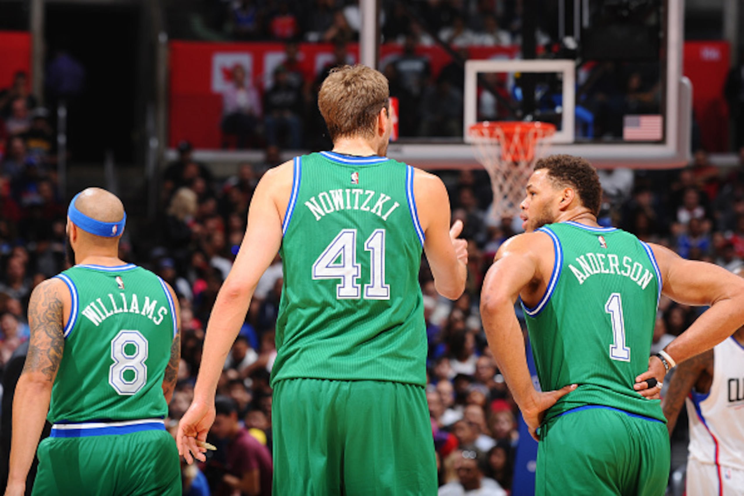 LOS ANGELES, CA  - APRIL 10: Deron Williams #8, Dirk Nowitzki #41 and Justin Anderson #1 of the Dallas Mavericks during the game against the Los Angeles Clippers on April 10, 2016 at STAPLES Center in Los Angeles, California. NOTE TO USER: User expressly 