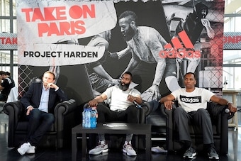 USA's NBA basketball player James Harden (C) gives a press conference on August 20, 2016 in Paris.  / AFP / BERTRAND GUAY        (Photo credit should read BERTRAND GUAY/AFP/Getty Images)