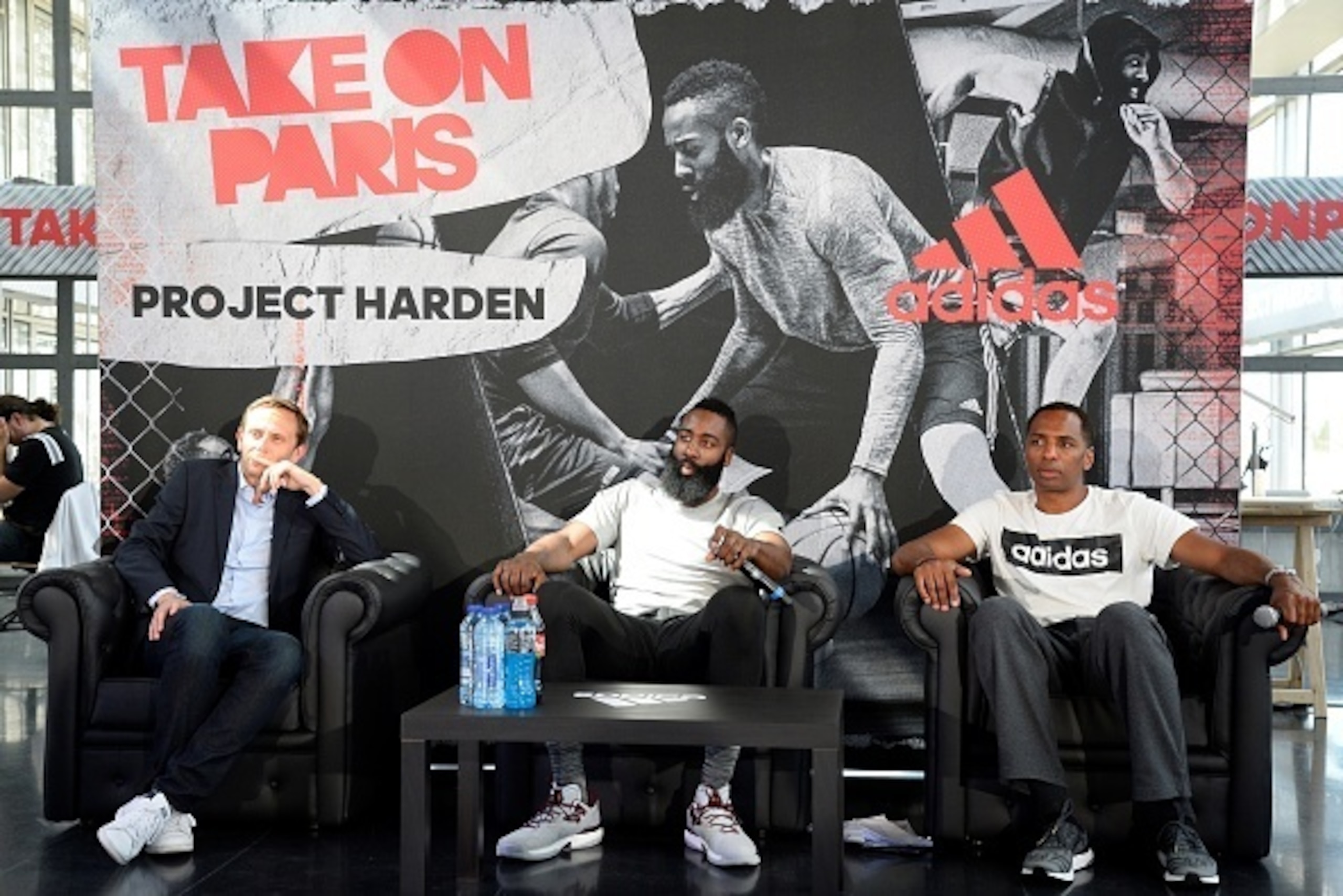 USA's NBA basketball player James Harden (C) gives a press conference on August 20, 2016 in Paris.  / AFP / BERTRAND GUAY        (Photo credit should read BERTRAND GUAY/AFP/Getty Images)