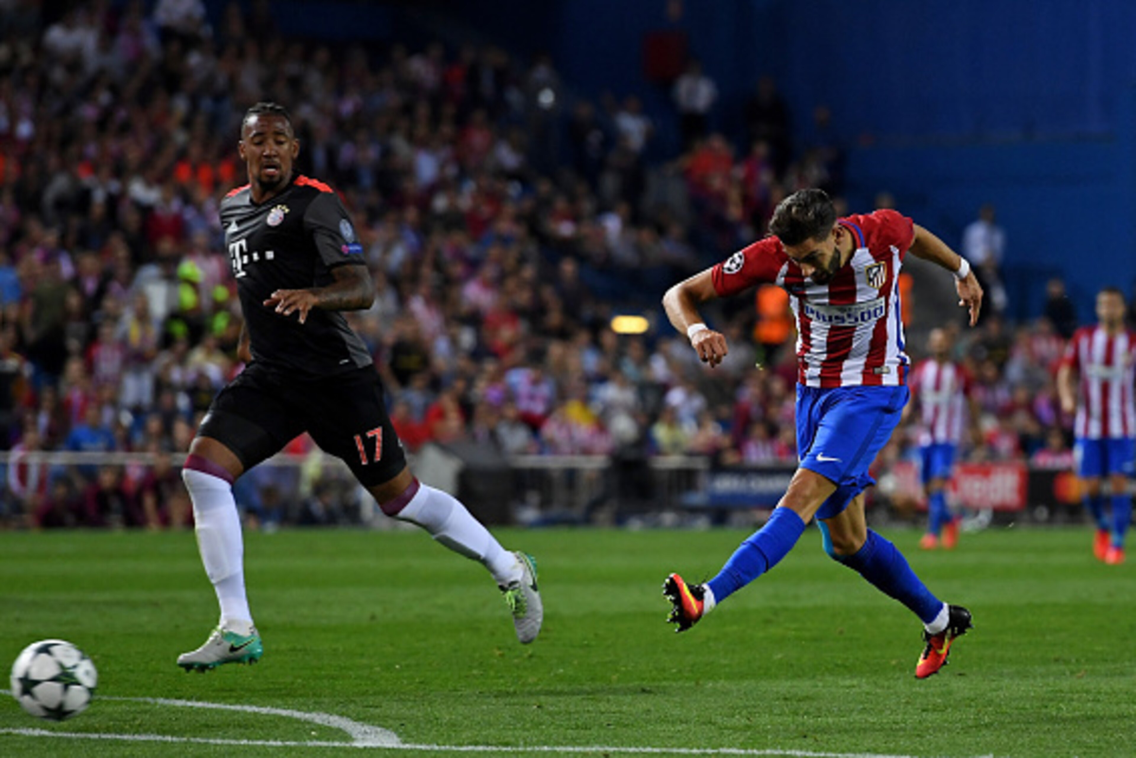 MADRID, SPAIN - SEPTEMBER 28: Yannick Ferreira Carrasco of Atletico Madrid scores the opening goal during the UEFA Champions League group D match between Club Atletico de Madrid and FC Bayern Muenchen at the Vicente Calderon Stadium on September 28, 2016 MADRID, SPAIN - SEPTEMBER 28: Yannick Ferreira Carrasco of Atletico Madrid scores the opening goal during the UEFA Champions League group D match between Club Atletico de Madrid and FC Bayern Muenchen at the Vicente Calderon Stadium on September 28, 2016