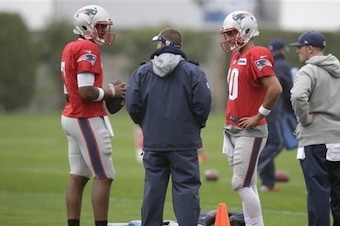 Patriots quarterbacks Jacoby Brissett (left) and Jimmy Garoppolo (right).