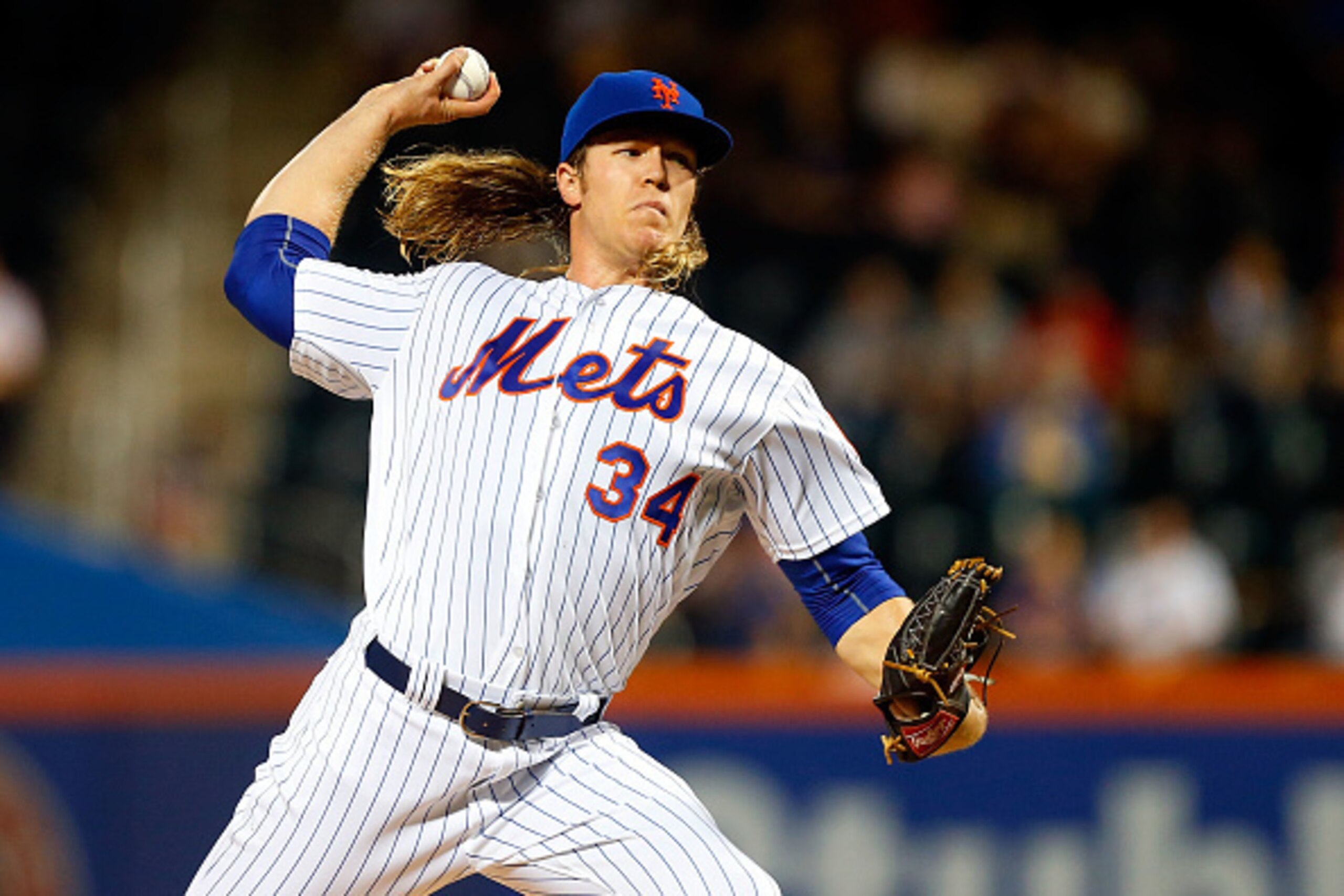 NEW YORK, NY - SEPTEMBER 19:  Noah Syndergaard #34 of the New York Mets pitches in the first inning against the Atlanta Braves at Citi Field on September 19, 2016 in the Flushing neighborhood of the Queens borough of New York City.  (Photo by Jim McIsaac/