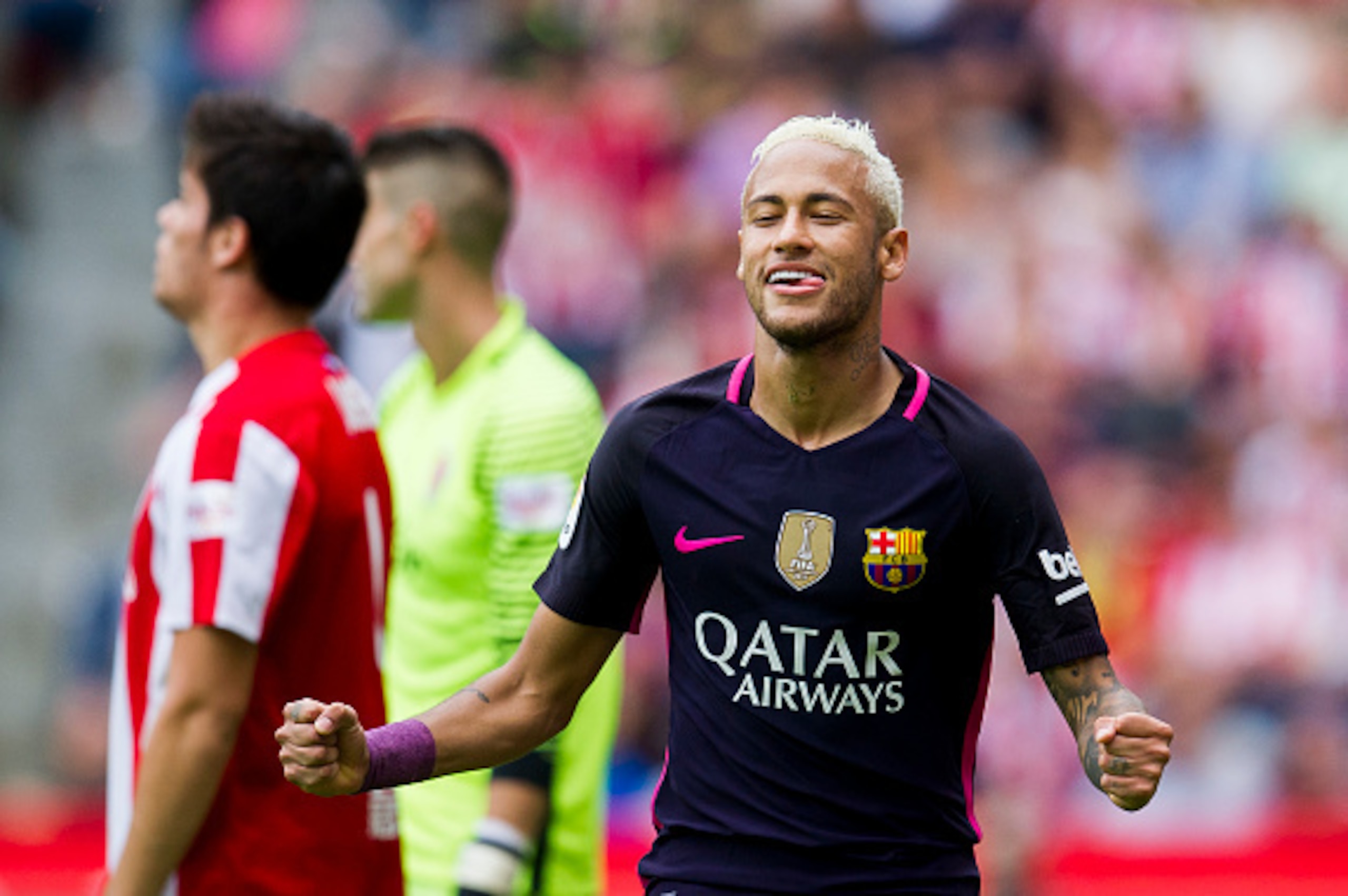 GIJON, SPAIN - SEPTEMBER 24:  Neymar of FC Barcelona celebrates after scoring his team's third goal during the La Liga match between Real Sporting de Gijon and FC Barcelona at Estadio El Molinon on September 24, 2016 in Gijon, Spain.  (Photo by Juan Manue