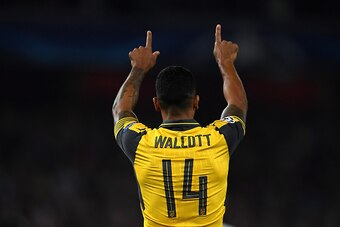 LONDON, ENGLAND - SEPTEMBER 28:  Theo Walcott of Arsenal ceclebrates after scoring the opening goal during the UEFA Champions League group A match between Arsenal FC and FC Basel 1893 at the Emirates Stadium on September 28, 2016 in London, England.  (Pho
