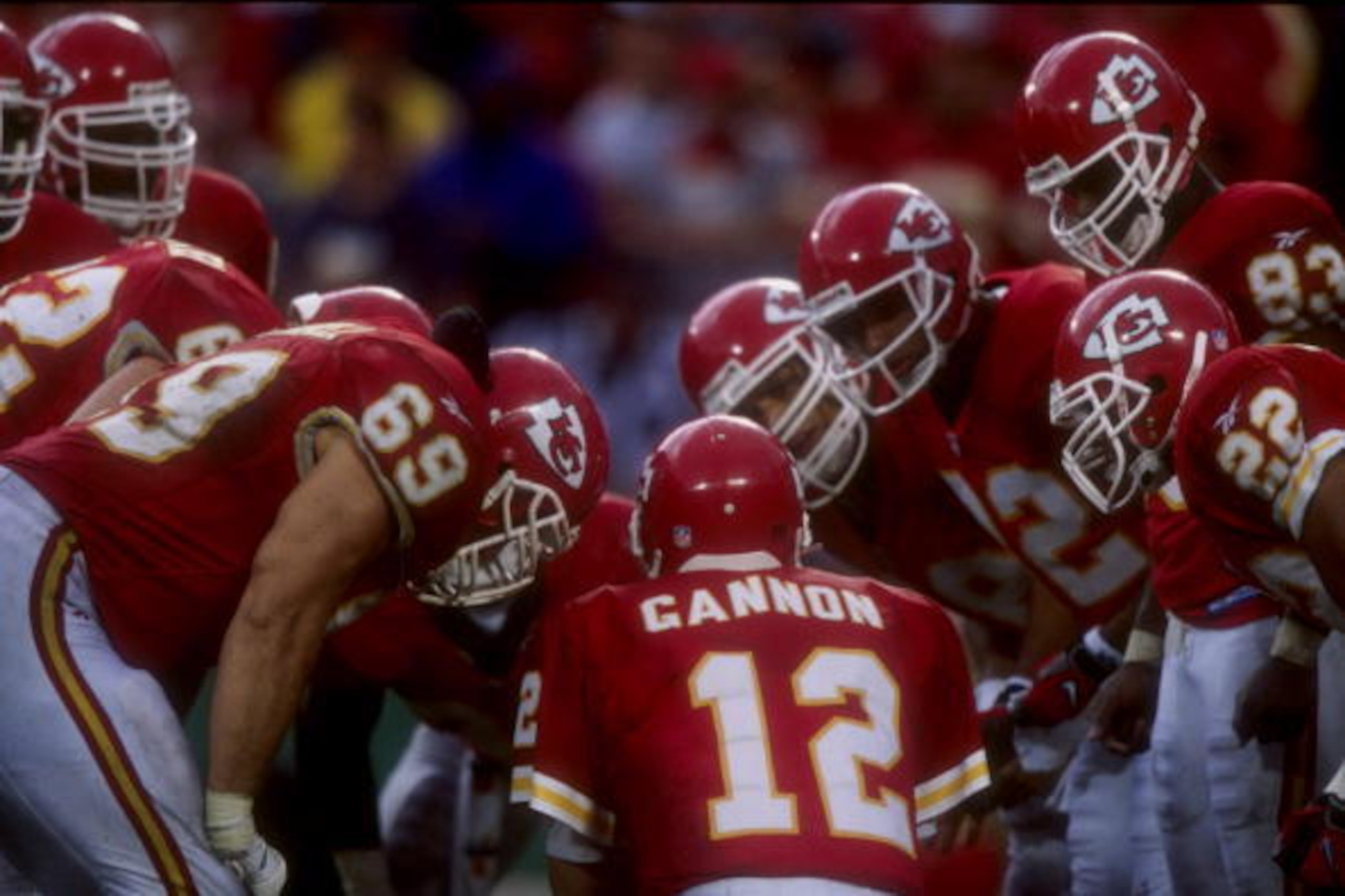 20 Sep 1998: Quarterback Rich Gannon #12 of the Kansas City Chiefs huddles with teammates during the game against the San Diego Chargers at  Arrowhead Stadium in Kansas City, Missouri. The Chiefs defeated the Chargers 23-7.Dunn  /Allsport