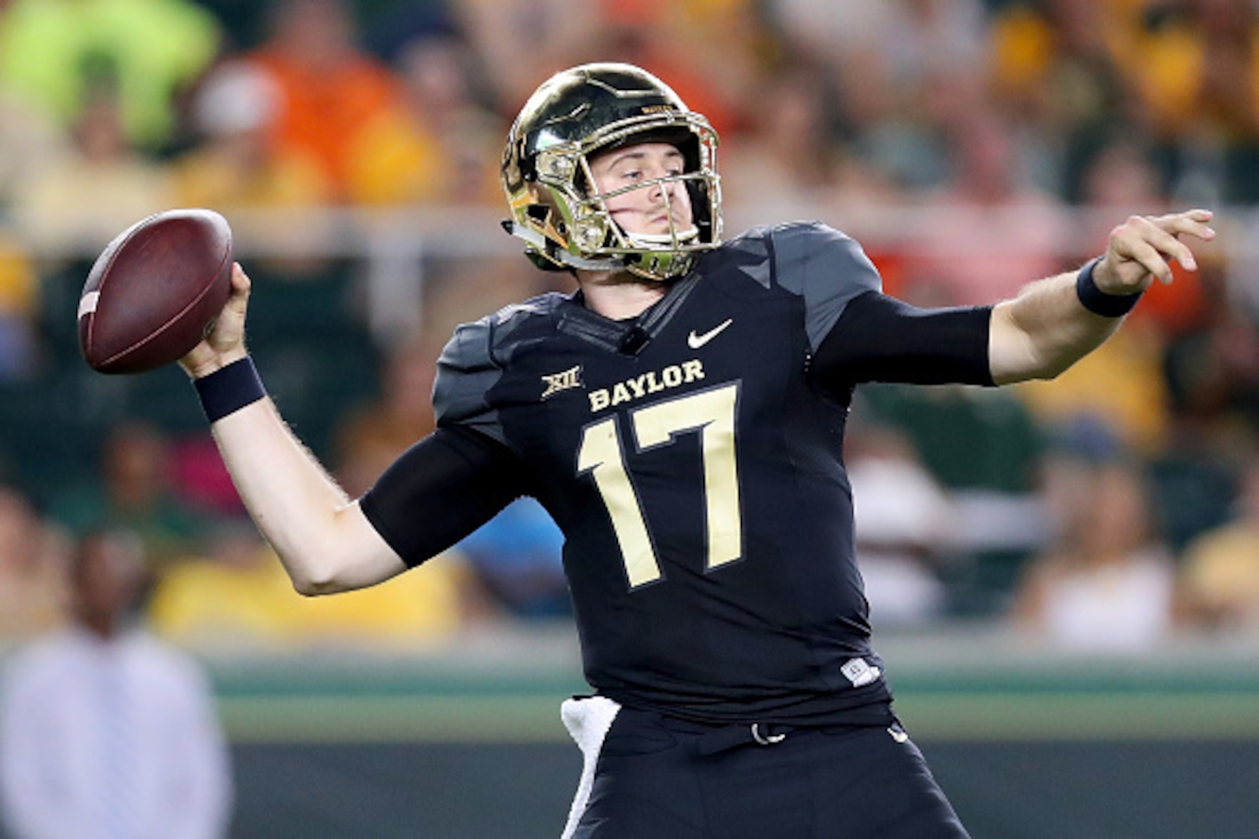 WACO, TX - SEPTEMBER 24: Seth Russell #17 of the Baylor Bears looks for an open receiver against the Oklahoma State Cowboys in the second half at McLane Stadium on September 24, 2016 in Waco, Texas. (Photo by Tom Pennington/Getty Images) WACO, TX - SEPTEMBER 24: Seth Russell #17 of the Baylor Bears looks for an open receiver against the Oklahoma State Cowboys in the second half at McLane Stadium on September 24, 2016 in Waco, Texas. (Photo by Tom Pennington/Getty Images)