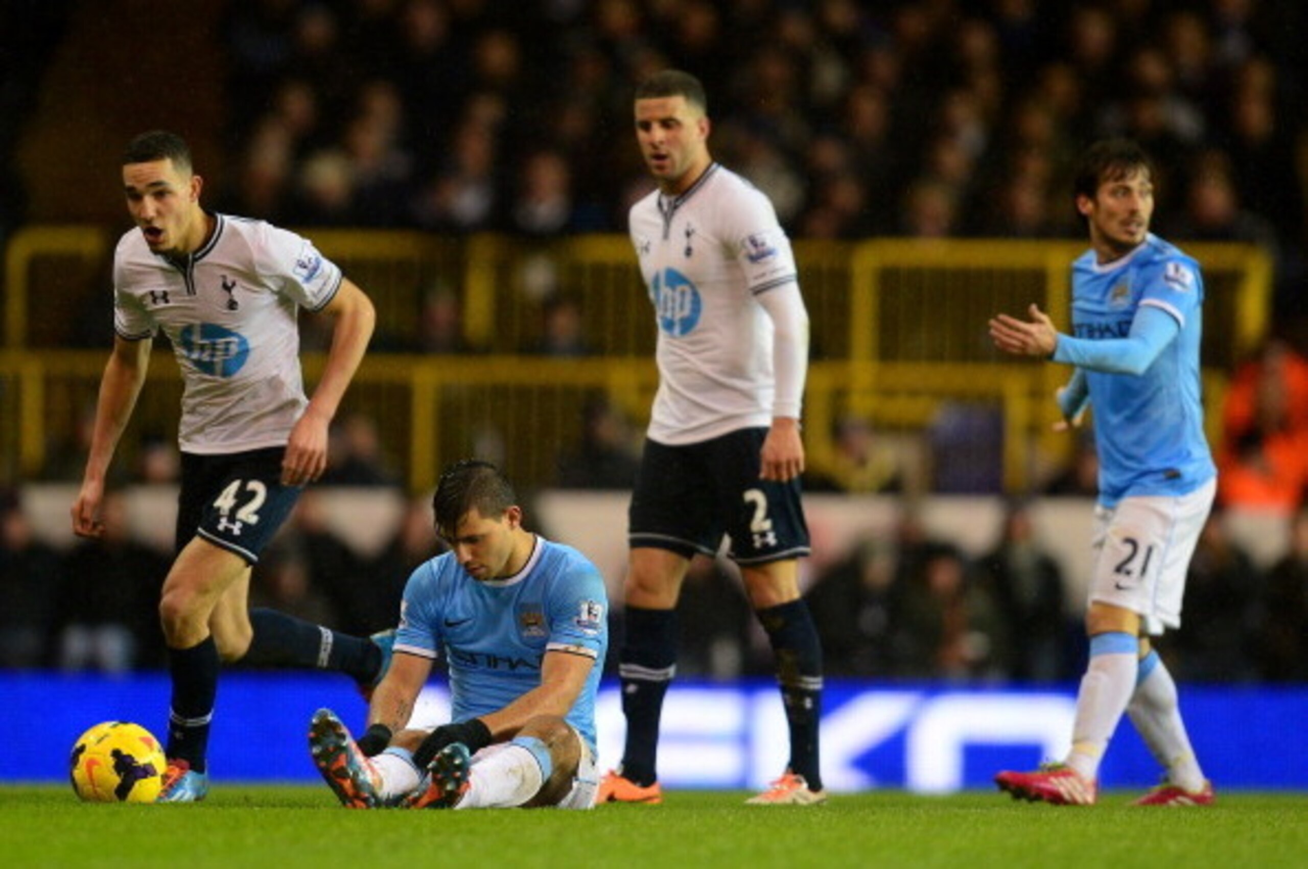 LONDON, ENGLAND - JANUARY 29:  Sergio Aguero of Manchester City sits injured on the pitch  during the Barclays Premier League match between Tottenham Hotspur and Manchester City at White Hart Lane on January 29, 2014 in London, England.  (Photo by Jamie M