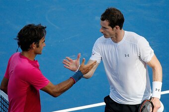 CINCINNATI, OH - AUGUST 22: Roger Federer of Switzerland (L) shakes hands with Andy Murray of Great Britain after winning during the semifinals of the Western & Southern Open at the Linder Family Tennis Center on August 22, 2015 in Cincinnati, Ohio.  (Pho