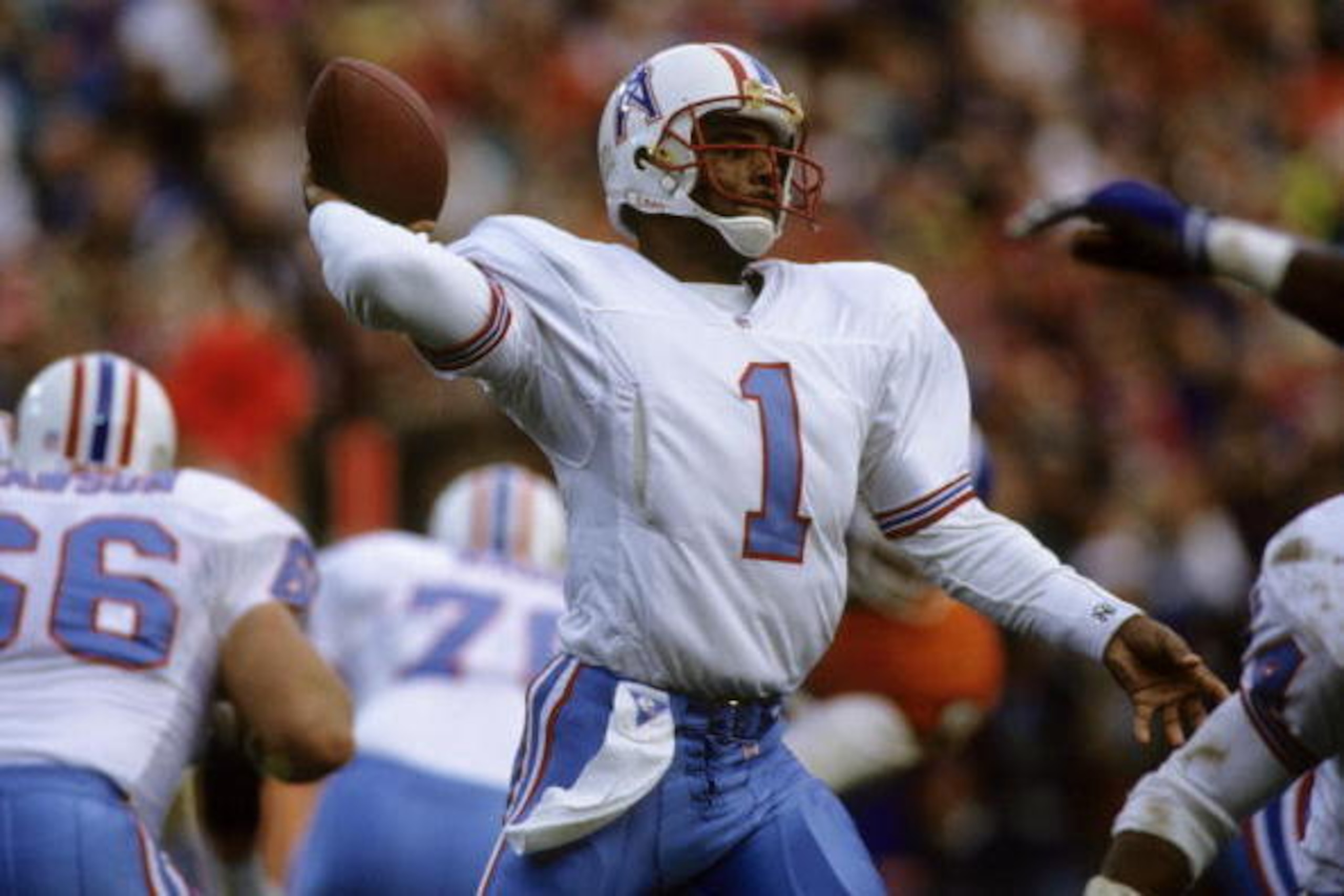 Houston Oilers quarterback Warren Moon (1), elected to the Pro Football Hall of Fame class of 2006, fires a pass during the AFC Divisional Playoff, a 26-24 loss to the Denver Broncos on January 4, 1992, at Mile High Stadium in Denver, Colorado. (Photo by 