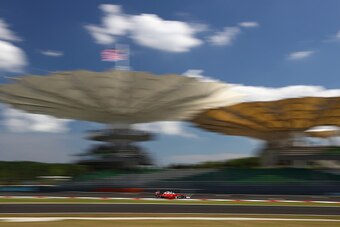 KUALA LUMPUR, MALAYSIA - SEPTEMBER 30: Sebastian Vettel of Germany driving the (5) Scuderia Ferrari SF16-H Ferrari 059/5 turbo (Shell GP) on track during practice for the Malaysia Formula One Grand Prix at Sepang Circuit on September 30, 2016 in Kuala Lum