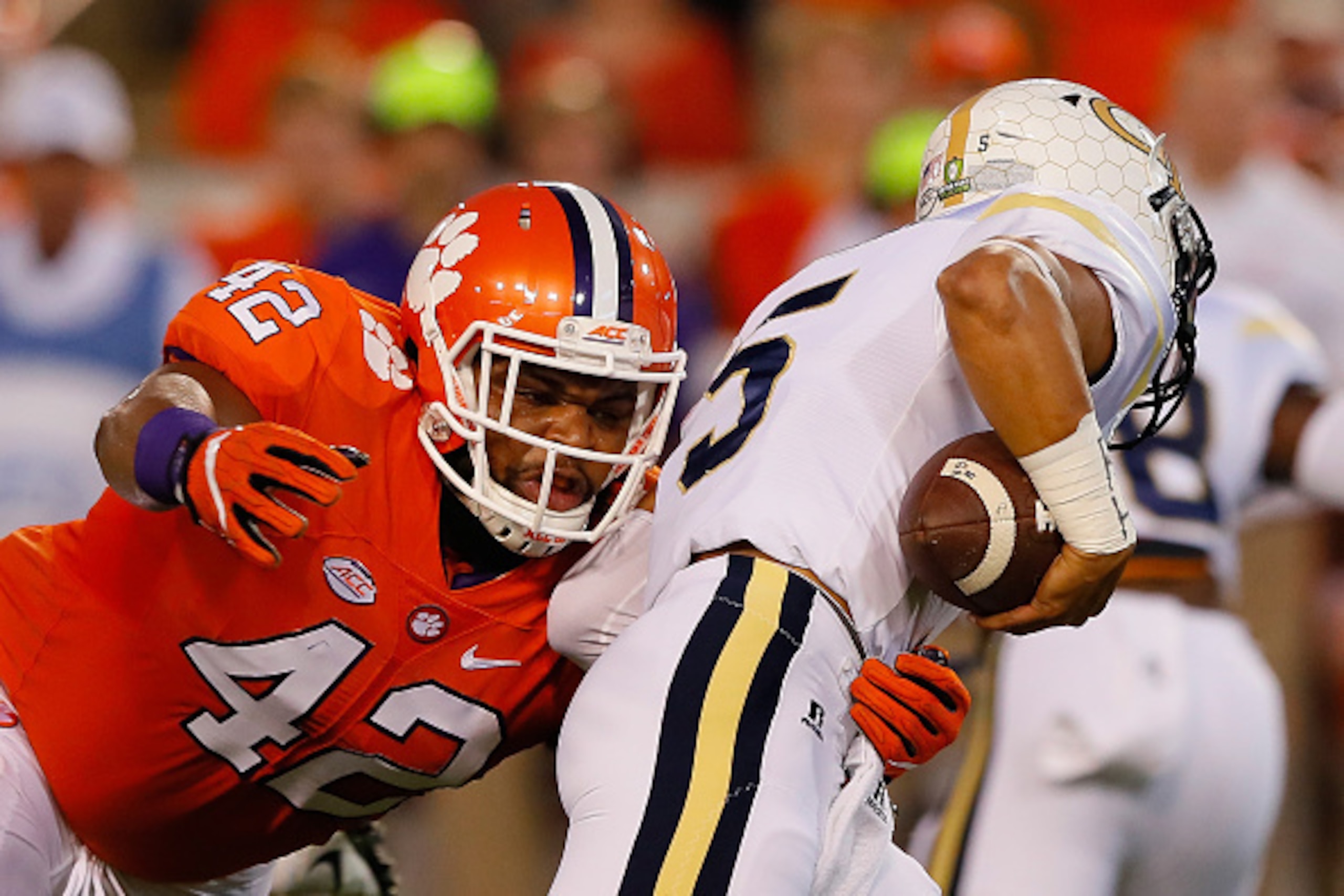 ATLANTA, GA - SEPTEMBER 22:  Christian Wilkins #42 of the Clemson Tigers sacks Justin Thomas #5 of the Georgia Tech Yellow Jackets at Bobby Dodd Stadium on September 22, 2016 in Atlanta, Georgia.  (Photo by Kevin C. Cox/Getty Images)
