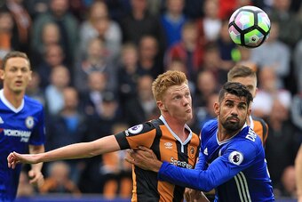 Hull City's English midfielder Sam Clucas (L) vies with Chelsea's Brazilian-born Spanish striker Diego Costa during the English Premier League football match between Hull City and Chelsea at the KCOM Stadium in Kingston upon Hull, north east England on Oc