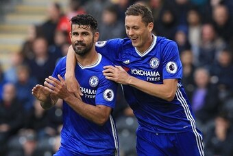 Chelsea's Brazilian-born Spanish striker Diego Costa (L) celebrates with Chelsea's Serbian midfielder Nemanja Matic after scoring their second goal during the English Premier League football match between Hull City and Chelsea at the KCOM Stadium in Kings