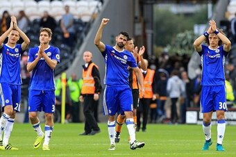Chelsea players (L-R) Chelsea's Serbian midfielder Nemanja Matic, Chelsea's Spanish defender Marcos Alonso, Chelsea's Brazilian-born Spanish striker Diego Costa and Chelsea's Brazilian defender David Luiz celebrate on the pitch after the English Premier L