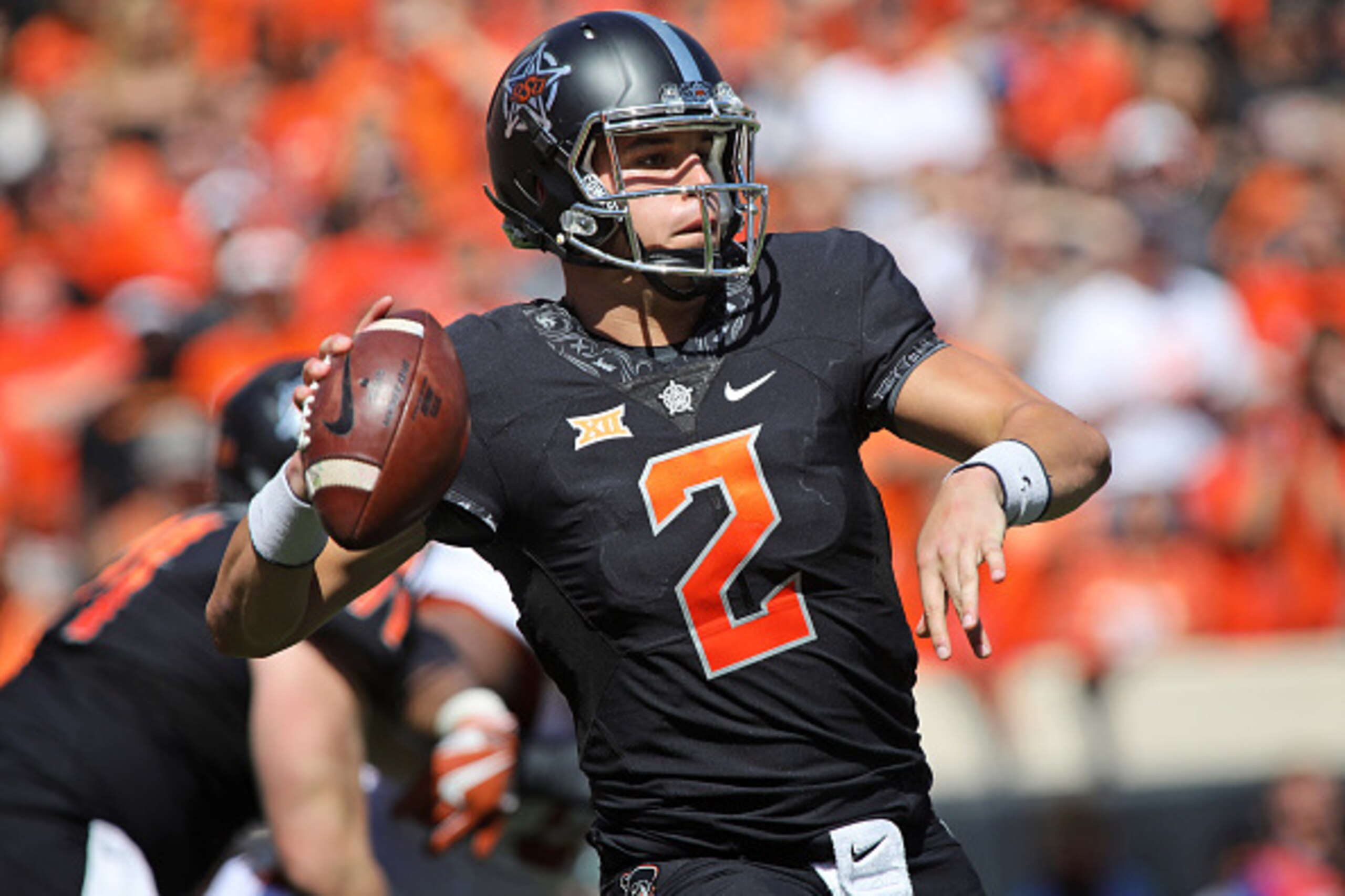 STILLWATER, OK - OCTOBER 1 : Quarterback Mason Rudolph #2 of the Oklahoma State Cowboys looks to throw against the Texas Longhorns October 1, 2016 at Boone Pickens Stadium in Stillwater, Oklahoma. The Cowboys defeated the Longhorns 49-31.  (Photo by Brett