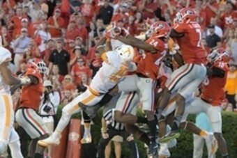 Oct 1, 2016; Athens, GA, USA; Tennessee Volunteers wide receiver Jauan Jennings (15) catches a game winning touchdown pass in front of Georgia Bulldogs safety Dominick Sanders (24) on the last play on the game during the fourth quarter at Sanford Stadium.