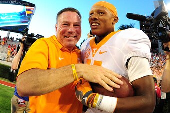 ATHENS, GA - OCTOBER 1: Joshua Dobbs #11 and Coach Butch Jones of the Tennessee Volunteers celebrate after the game against the Georgia Bulldogs at Sanford Stadium on October 1, 2016 in Athens, Georgia. (Photo by Scott Cunningham/Getty Images)