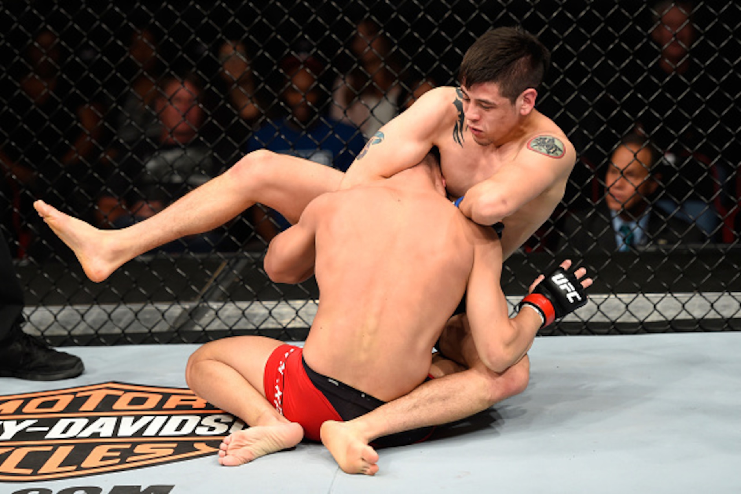 PORTLAND, OR - OCTOBER 01:  (R-L) Brandon Moreno of Mexico attempts to submit Louis Smolka in their flyweight bout during the UFC Fight Night event at the Moda Center on October 1, 2016 in Portland, Oregon. (Photo by Josh Hedges/Zuffa LLC/Zuffa LLC via Ge