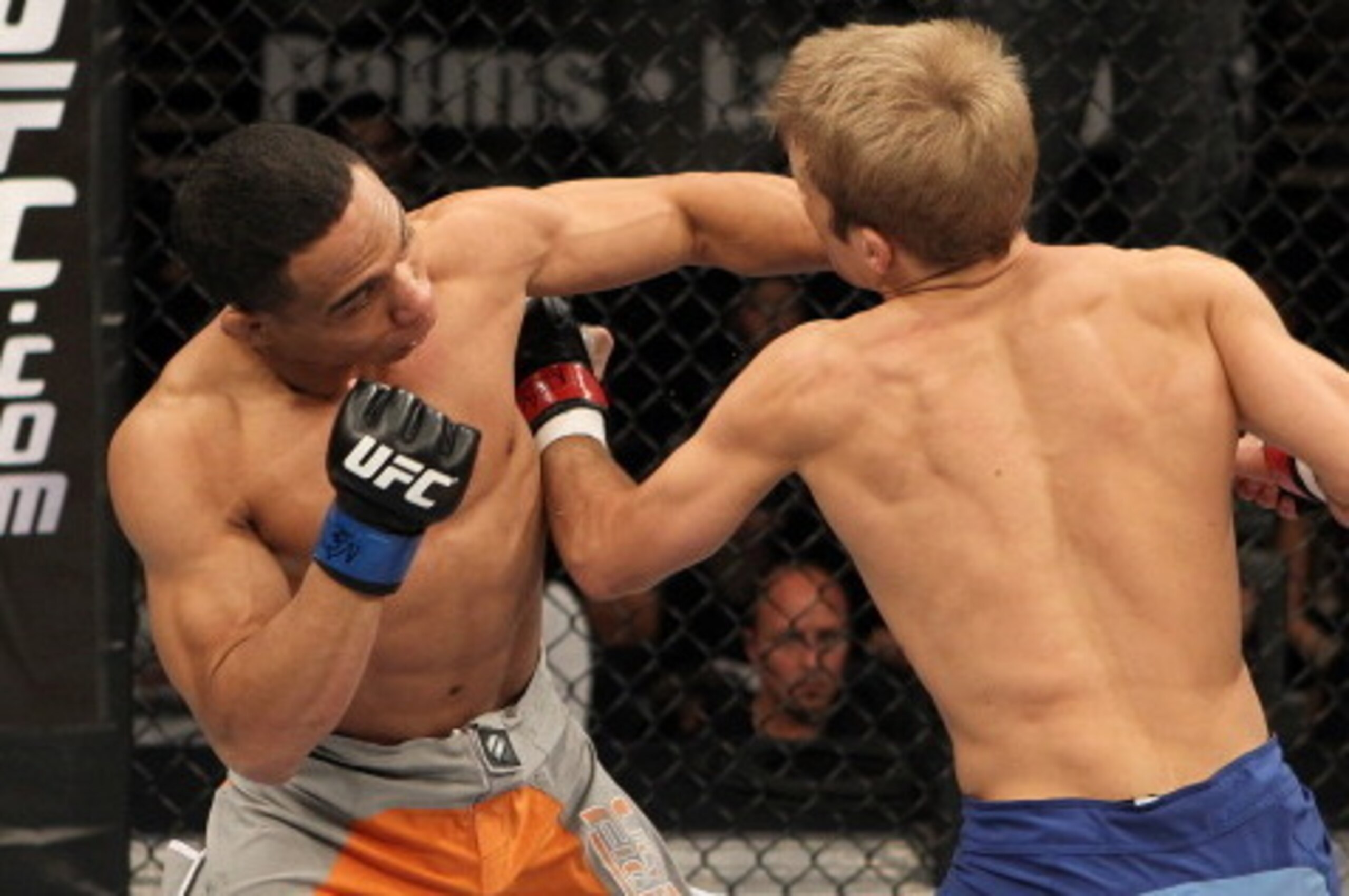 LAS VEGAS - DECEMBER 03:  (L-R) John Dodson and TJ Dillashaw exchange blows during The Ultimate Fighter 14 Finale at the Pearl Theatre at the Palms Hotel and Casino on December 3, 2011 in Las Vegas, Nevada.  (Photo by Josh Hedges/Zuffa LLC/Zuffa LLC via G