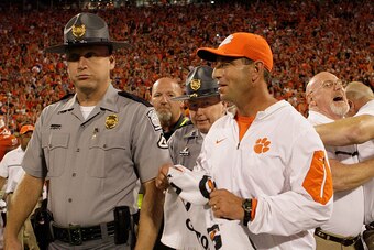 CLEMSON, SC - OCTOBER 01:  Head coach Dabo Swinney of the Clemson Tigers walks off the field after his team defeated the Louisville Cardinals at Memorial Stadium on October 1, 2016 in Clemson, South Carolina. The Clemson Tigers defeated the Louisville Car