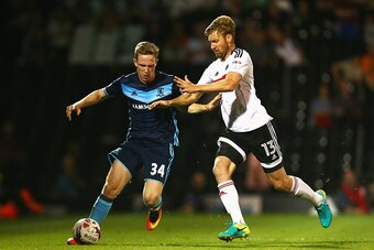 LONDON, ENGLAND - AUGUST 24: Adam Forshaw of Middlesbrough is challenged by Tim Ream of Fulham during the EFL Cup second round match between Fulham and Middlesbrough at Craven Cottage on August 24, 2016 in London, England.  (Photo by Jordan Mansfield/Gett