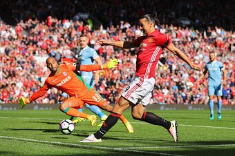 MANCHESTER, ENGLAND - OCTOBER 02:  Lee Grant of Stoke City (L) saves Zlatan Ibrahimovic of Manchester United (R) shot during the Premier League match between Manchester United and Stoke City at Old Trafford on October 2, 2016 in Manchester, England.  (Pho