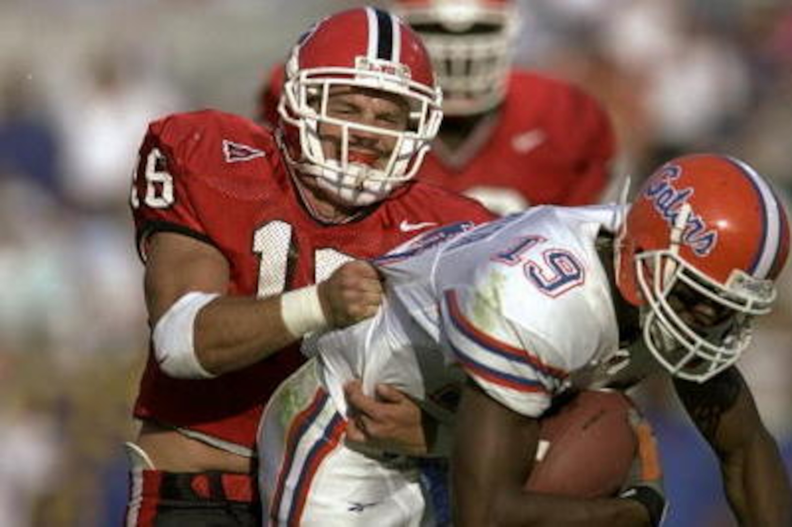 31 Oct 1998: Travis Taylor #19 of the Florida Gators grips the ball as he is tackled by Kirby Smart #16 of the Georgia Bulldogs at Alltel Stadium in Jacksonville, Florida. Florida defeated Georgia 38-7. Mandatory Credit: Andy Lyons /Allsport 31 Oct 1998: Travis Taylor #19 of the Florida Gators grips the ball as he is tackled by Kirby Smart #16 of the Georgia Bulldogs at Alltel Stadium in Jacksonville, Florida. Florida defeated Georgia 38-7. Mandatory Credit: Andy Lyons /Allsport