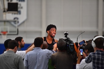 STOCKTON, NJ - SEPTEMBER 27:  Joel Embiid #21 of the Philadelphia 76ers talks to the media after practice at Stockton University on September 27, 2016 in Camden, New Jersey. NOTE TO USER: User expressly acknowledges and agrees that, by downloading and/or