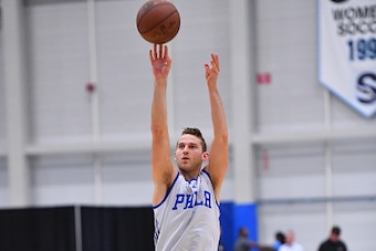 STOCKTON, NJ - SEPTEMBER 27:  Nik Stauskas #11 of the Philadelphia 76ers stretches during practice at Stockton University on September 27, 2016 in Camden, New Jersey. NOTE TO USER: User expressly acknowledges and agrees that, by downloading and/or using t