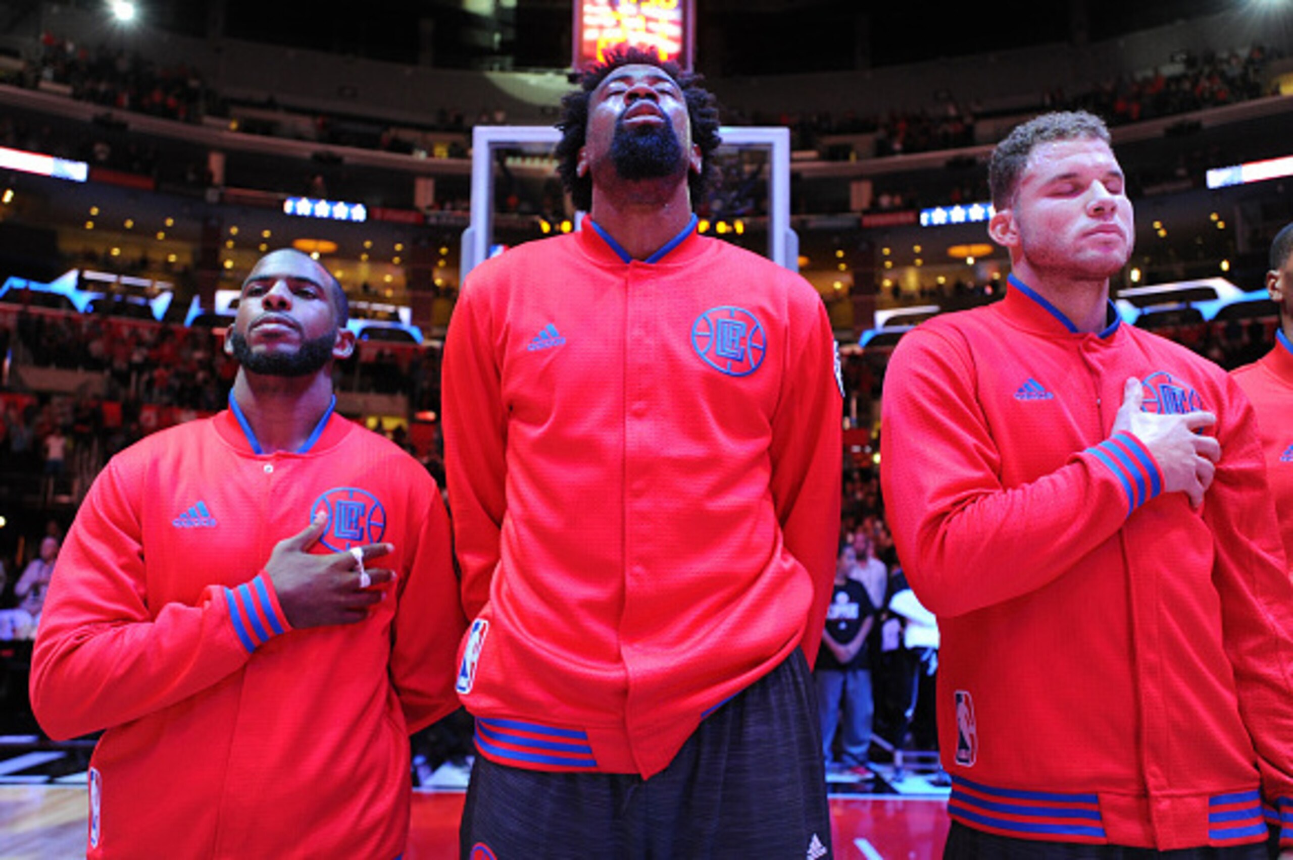 LOS ANGELES, CA - OCTOBER 31:  Chris Paul #3 of the Los Angeles Clippers, DeAndre Jordan #6 of the Los Angeles Clippers, and Blake Griffin #32 of the Los Angeles Clippers stand for the national anthem before the game against the Sacramento Kings on Octobe