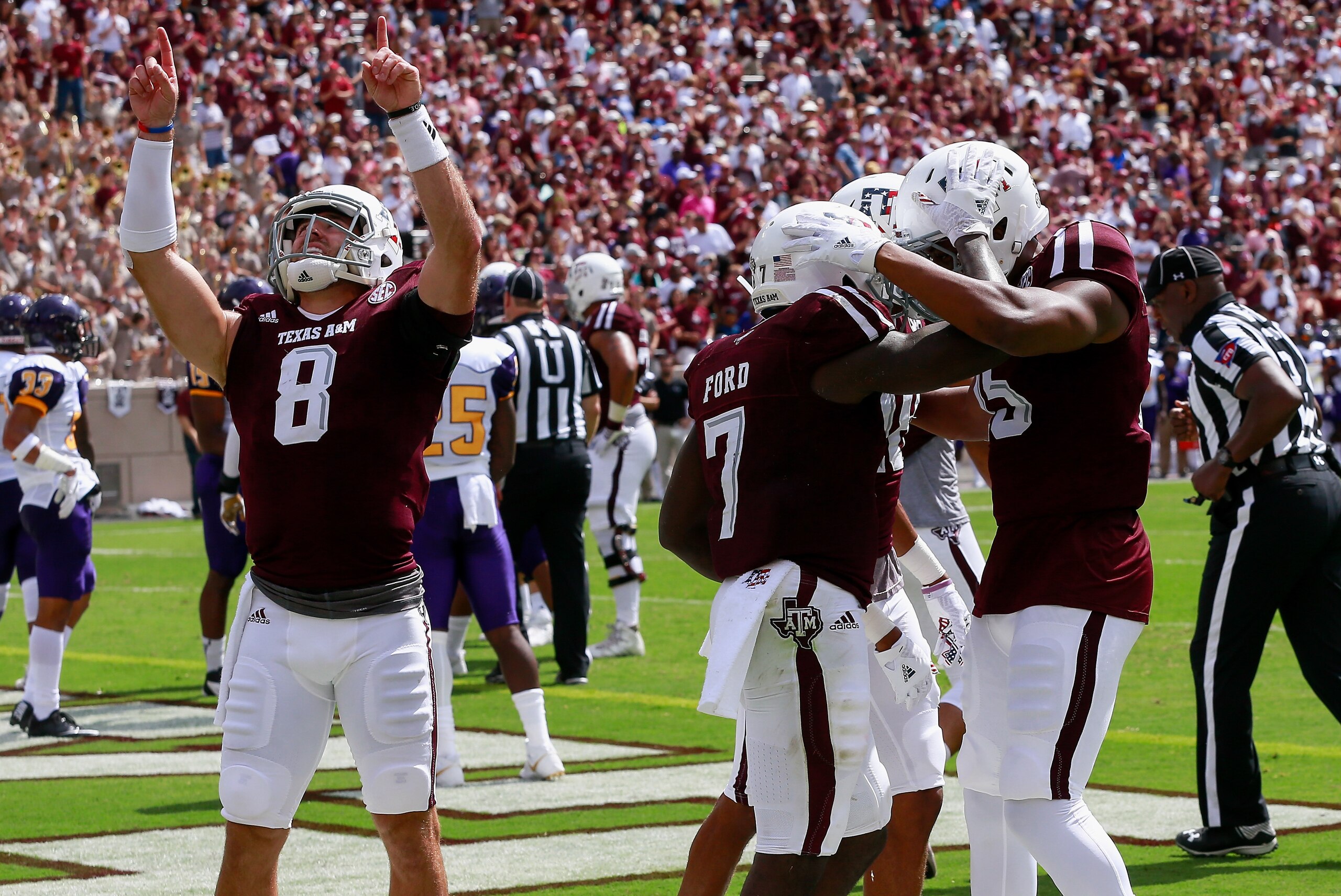COLLEGE STATION, TX - SEPTEMBER 10:  Keith Ford #7 of the Texas A&M Aggies celenbrtates with teammates after a first quarter score against the Prairie View A&M Panthers at Kyle Field on September 10, 2016 in College Station, Texas.  (Photo by Bob Levey/Ge