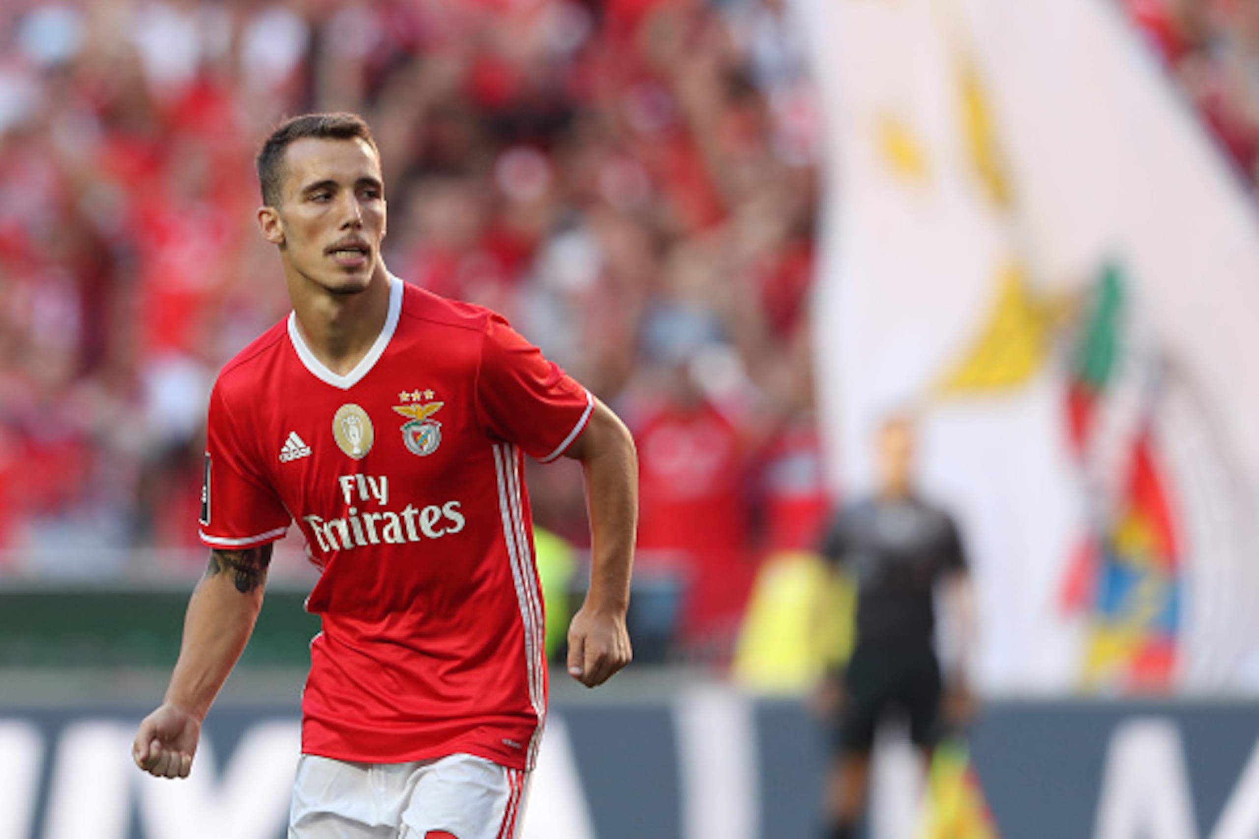 LISBON, PORTUGAL - OCTOBER 02:  SL Benfica's defender from Spain Alex Grimaldo celebrates scoring Benfica's fourth goal during the SL Benfica v CD Feirense - Primeira Liga match at Estadio da Luz on October 02, 2016 in Lisbon, Portugal.  (Photo by Carlos 