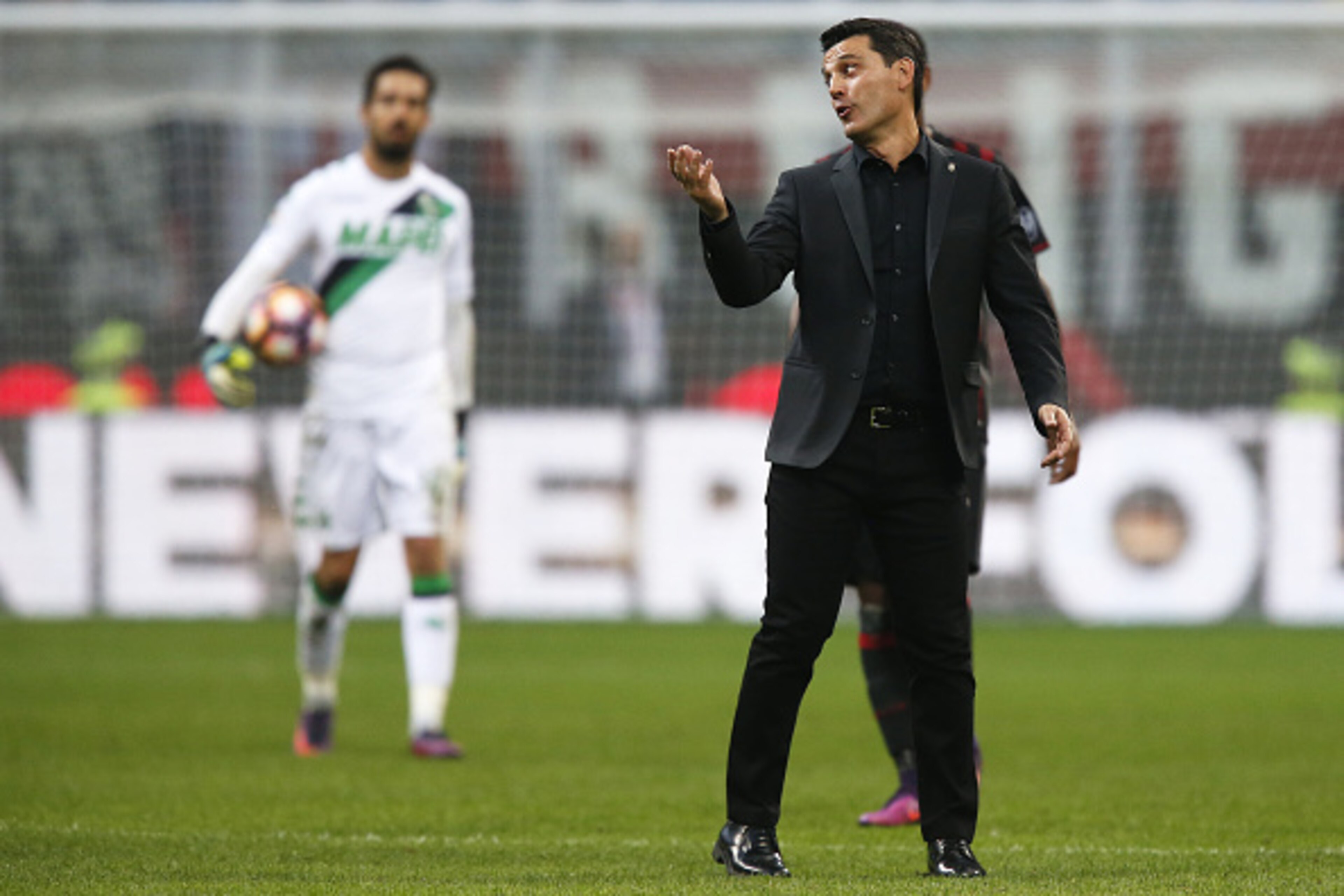 AC Milan's coach Vincenzo Montella reacts after a red card during the Italian Serie A football match AC Milan vs Sassuolo on October 2, 2016 at the San Siro stadium in Milan.  / AFP / MARCO BERTORELLO        (Photo credit should read MARCO BERTORELLO/AFP/