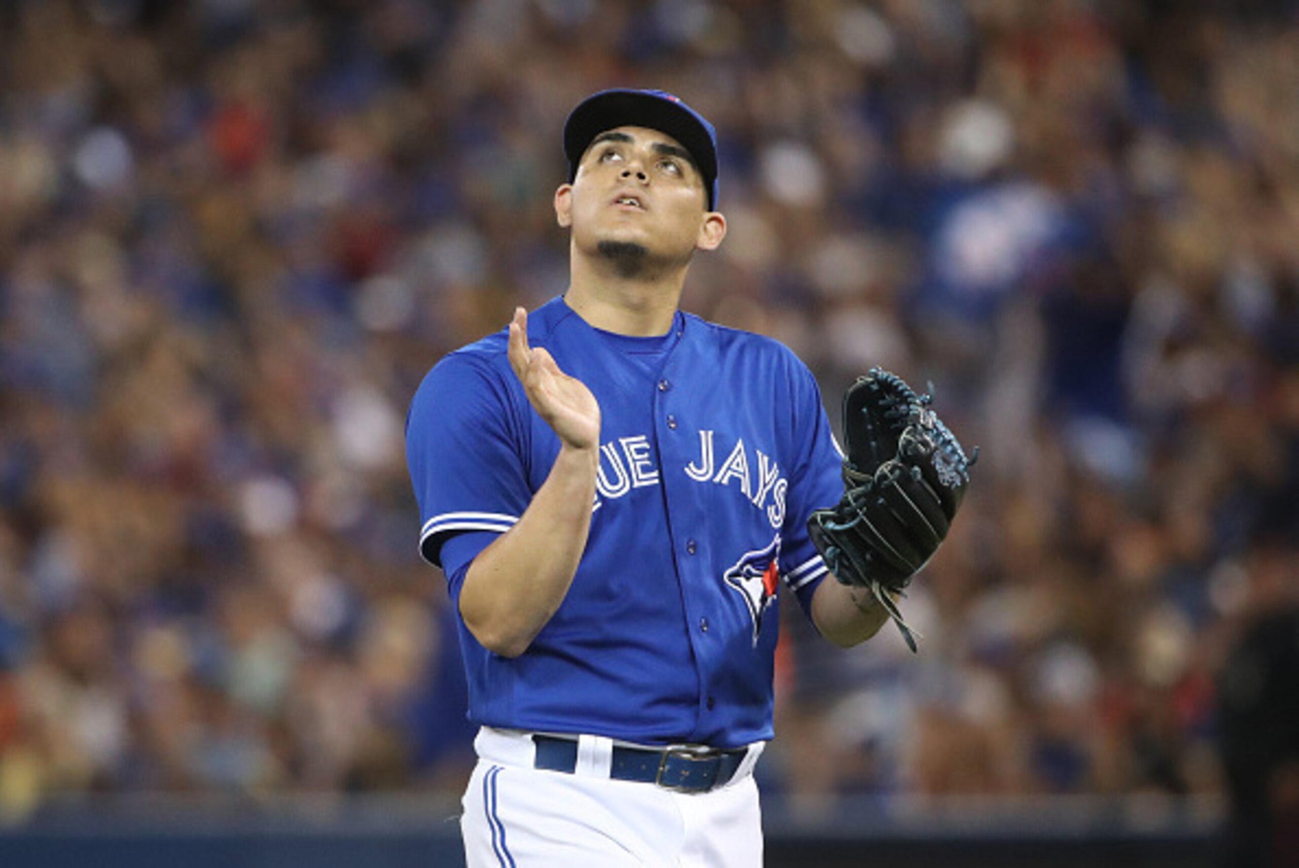 TORONTO, CANADA - JULY 31: Roberto Osuna #54 of the Toronto Blue Jays reacts after getting the last out of the ninth inning during MLB game action against the Baltimore Orioles on July 31, 2016 at Rogers Centre in Toronto, Ontario, Canada. (Photo by Tom S TORONTO, CANADA - JULY 31: Roberto Osuna #54 of the Toronto Blue Jays reacts after getting the last out of the ninth inning during MLB game action against the Baltimore Orioles on July 31, 2016 at Rogers Centre in Toronto, Ontario, Canada. (Photo by Tom S