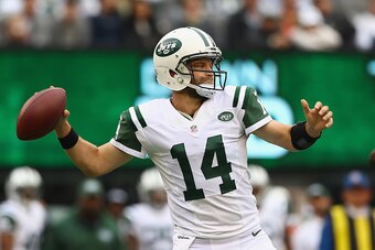 EAST RUTHERFORD, NJ - OCTOBER 02:  Quarterback Ryan Fitzpatrick #14 of the New York Jets looks to pass against the Seattle Seahawks in the first quarter at MetLife Stadium on October 2, 2016 in East Rutherford, New Jersey.  (Photo by Elsa/Getty Images)