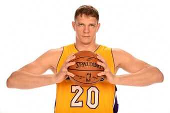 EL SEGUNDO, CA - SEPTEMBER 26:  Timofey Mozgov #20 of the of the Los Angeles Lakers poses for a portrait during the 2016-2017 Los Angeles Lakers Media Day at Toyota Sports Center on September 26, 2016 in El Segundo, California.  NOTE TO USER: User express