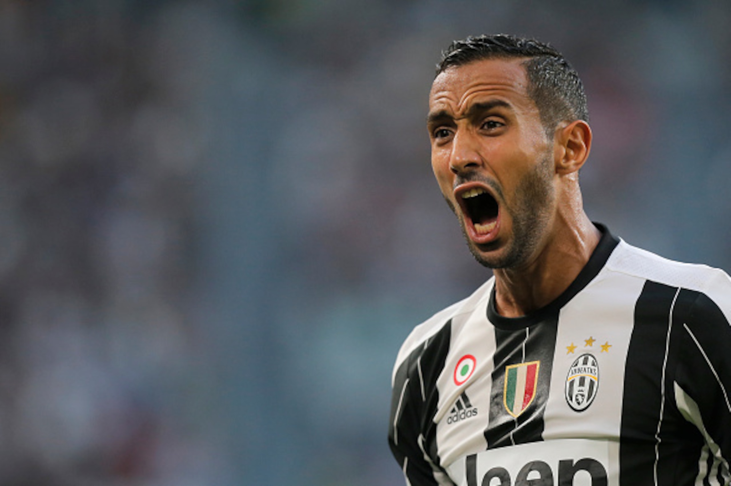 Juventus' defender Medhi Amine Benatia from Morocco reacts during the Italian Serie A football match Juventus Vs Sassuolo on September 10, 2016 at the 'Juventus Stadium' in Turin.  / AFP / MARCO BERTORELLO        (Photo credit should read MARCO BERTORELLO