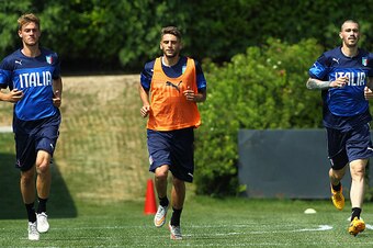 COMO, ITALY - JUNE 04:  (L-R) Daniele Rugani, Domenico Berardi and Alessio Romagnoli of Italy U21 train during Italy U21 training session at the club's training ground on June 4, 2015 in Appiano Gentile Como, Italy.  (Photo by Marco Luzzani/Getty Images)