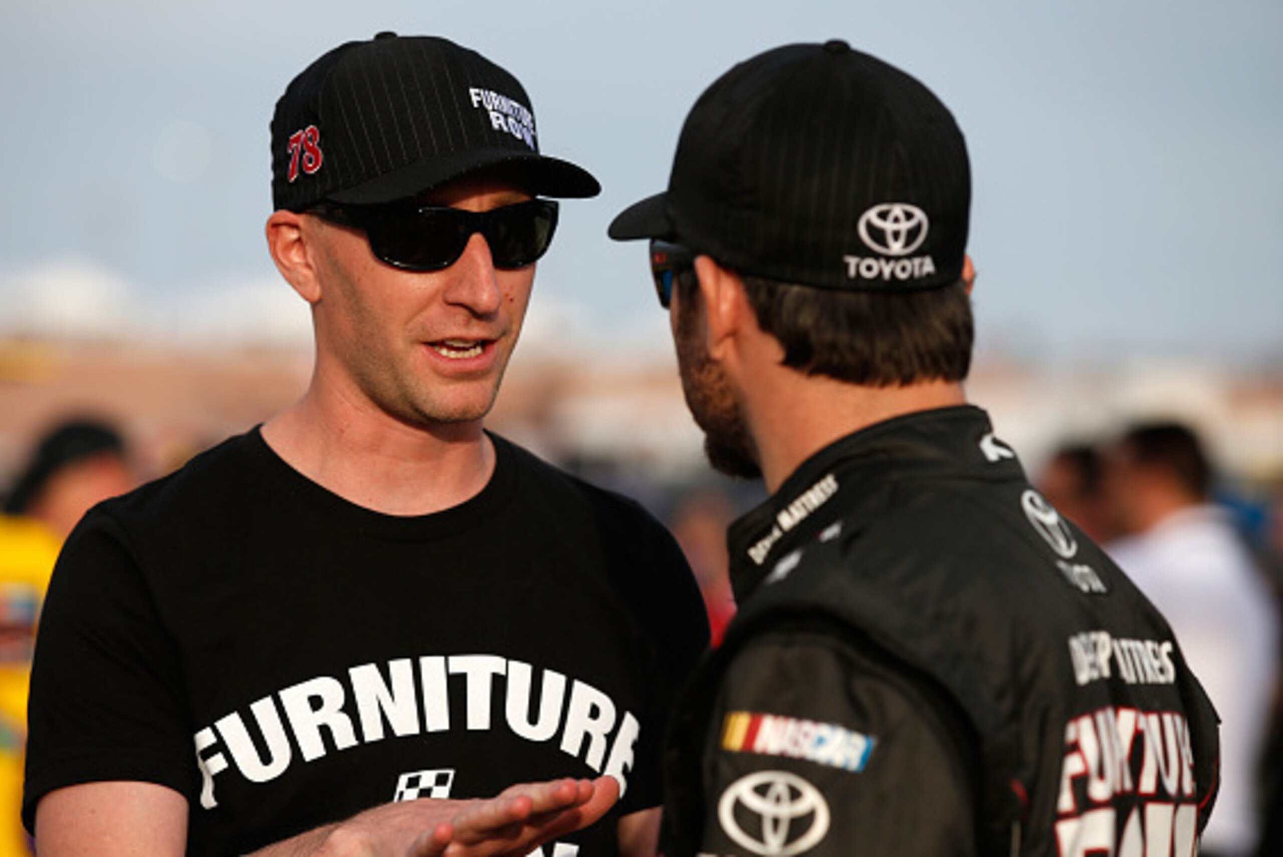 LAS VEGAS, NV - MARCH 04:  Cole Pearn, crew chief talks with Martin Truex Jr, driver of the #78 Furniture Row Toyota, during qualifying for the NASCAR Sprint Cup Series Kobalt 400 at Las Vegas Motor Speedway on March 4, 2016 in Las Vegas, Nevada.  (Photo 