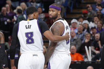 SACRAMENTO, CA - DECEMBER 15: Rudy Gay #8 and DeMarcus Cousins #15 of the Sacramento Kings talk during the game against the Houston Rockets on December 15, 2015 at Sleep Train Arena in Sacramento, California. NOTE TO USER: User expressly acknowledges and 