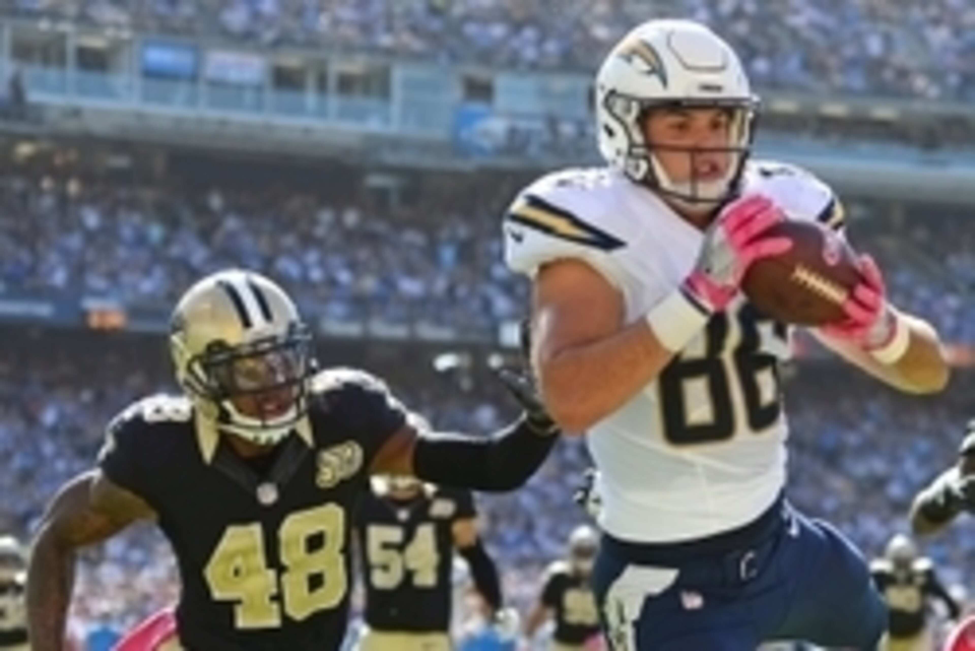 Oct 2, 2016; San Diego, CA, USA; San Diego Chargers tight end Hunter Henry (86) cannot bring in a catch during the second quarter as New Orleans Saints free safety Vonn Bell (48) defends at Qualcomm Stadium. Mandatory Credit: Jake Roth-USA TODAY Sports Oct 2, 2016; San Diego, CA, USA; San Diego Chargers tight end Hunter Henry (86) cannot bring in a catch during the second quarter as New Orleans Saints free safety Vonn Bell (48) defends at Qualcomm Stadium. Mandatory Credit: Jake Roth-USA TODAY Sports