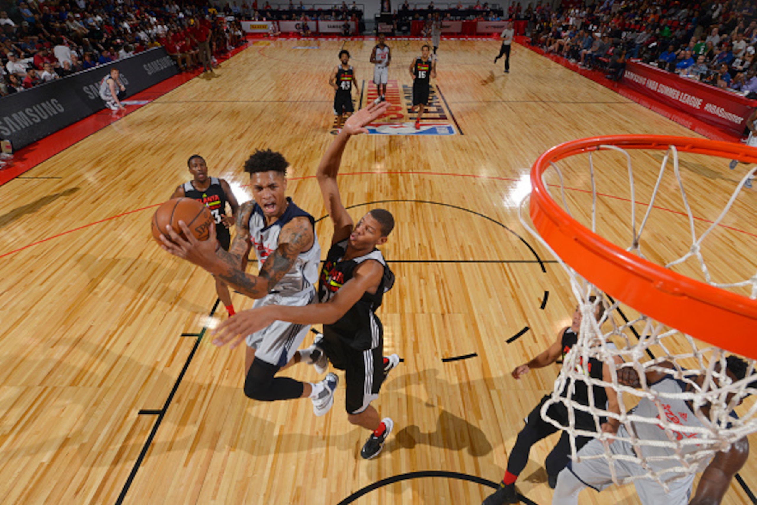 LAS VEGAS, NV - JULY 10: Kelly Oubre Jr, #12 of Washington Wizards goes for the layup against the Washington Wizards during the 2016 Las Vegas Summer League on July 10, 2016 at Cox Pavilion in Las Vegas, Nevada. NOTE TO USER: User expressly acknowledges a