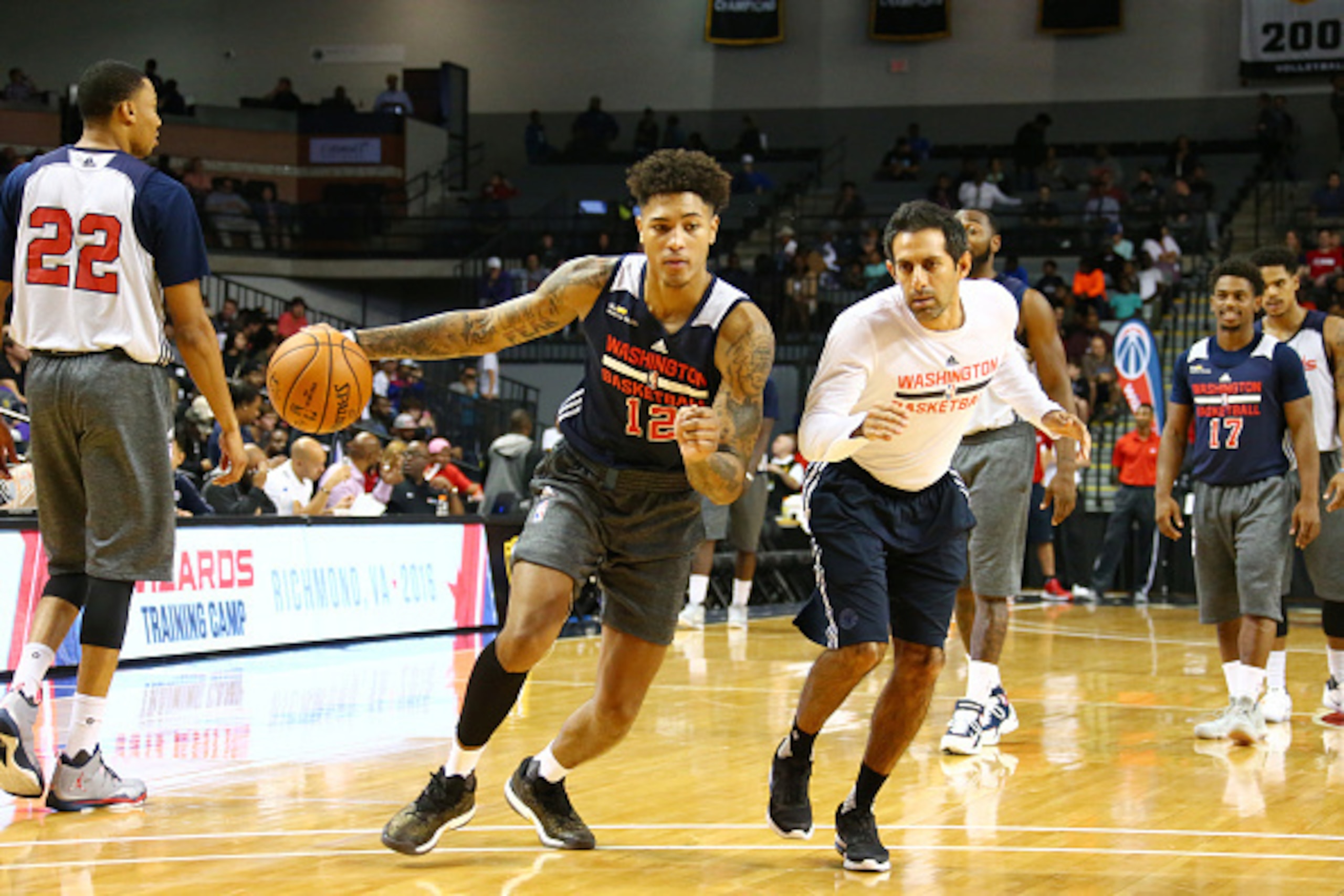 RICHMOND, VA - SEPTEMBER 30:  Kelly Oubre Jr. #12 of the Washington Wizards handles the ball during a 2016 Training Camp open practice for fans at Virginia Commonwealth University on September 30, 2016 in Richmond, Virginia.  NOTE TO USER: User expressly 