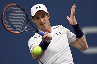 Andy Murray of Britain hits a return against Kei Nishikori of Japan during their 2016 US Open Mens Singles quarterfinal match at the USTA Billie Jean King National Tennis Center in New York on September 7, 2016. / AFP / Jewel SAMAD        (Photo credit sh