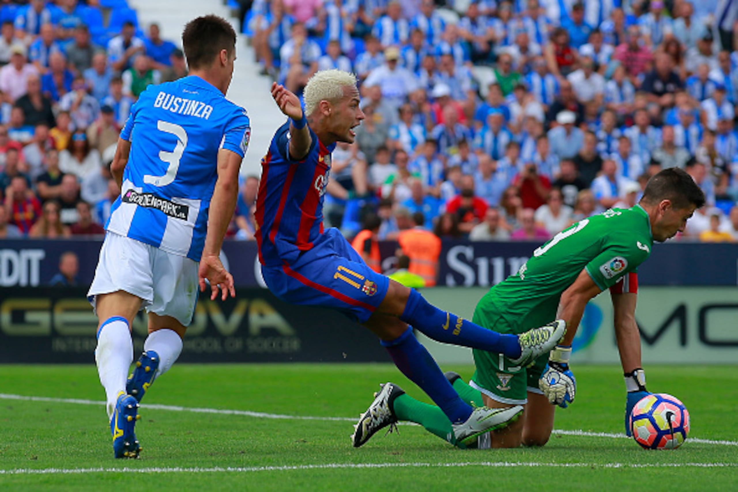 LEGANES, SPAIN - SEPTEMBER 17: Unai Bustinza (L) of Deportivo Leganes tackles Neymar JR during the La Liga match between Deportivo Leganes and FC Barcelona at Estadio Municipal de Butarque on September 17, 2016 in Leganes, Spain. (Photo by Gonzalo Arroyo 