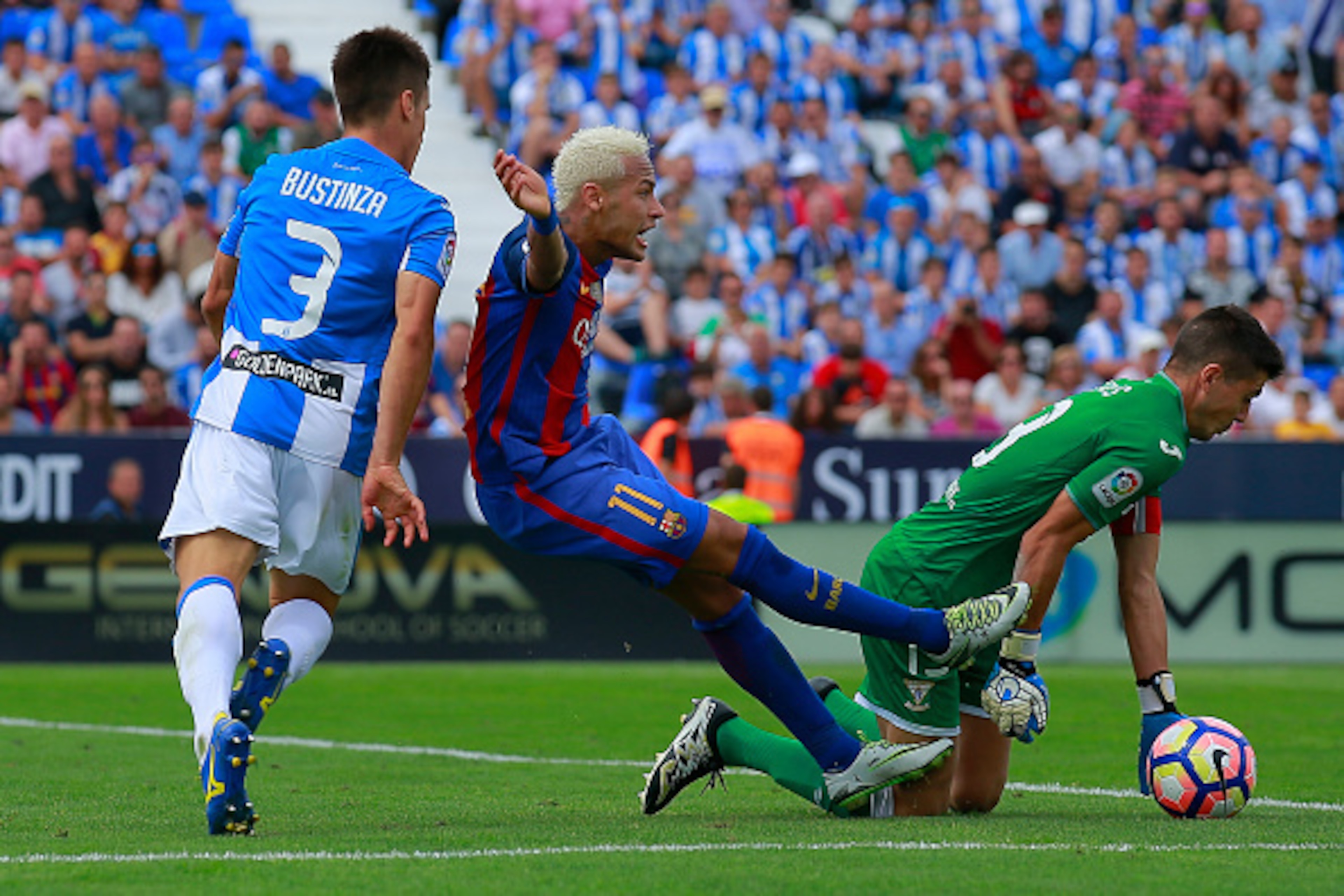 LEGANES, SPAIN - SEPTEMBER 17: Unai Bustinza (L) of Deportivo Leganes tackles Neymar JR during the La Liga match between Deportivo Leganes and FC Barcelona at Estadio Municipal de Butarque on September 17, 2016 in Leganes, Spain. (Photo by Gonzalo Arroyo 