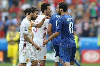 (l-r) Cesc Fabregas of Spain, Marco Parolo of Italy during the UEFA Euro 2016 round of 16 match between Italy and Spain on June 27, 2016 at the Stade de France in Paris, France.(Photo by VI Images via Getty Images)